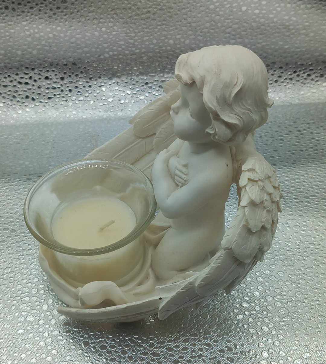 Engel lysholder