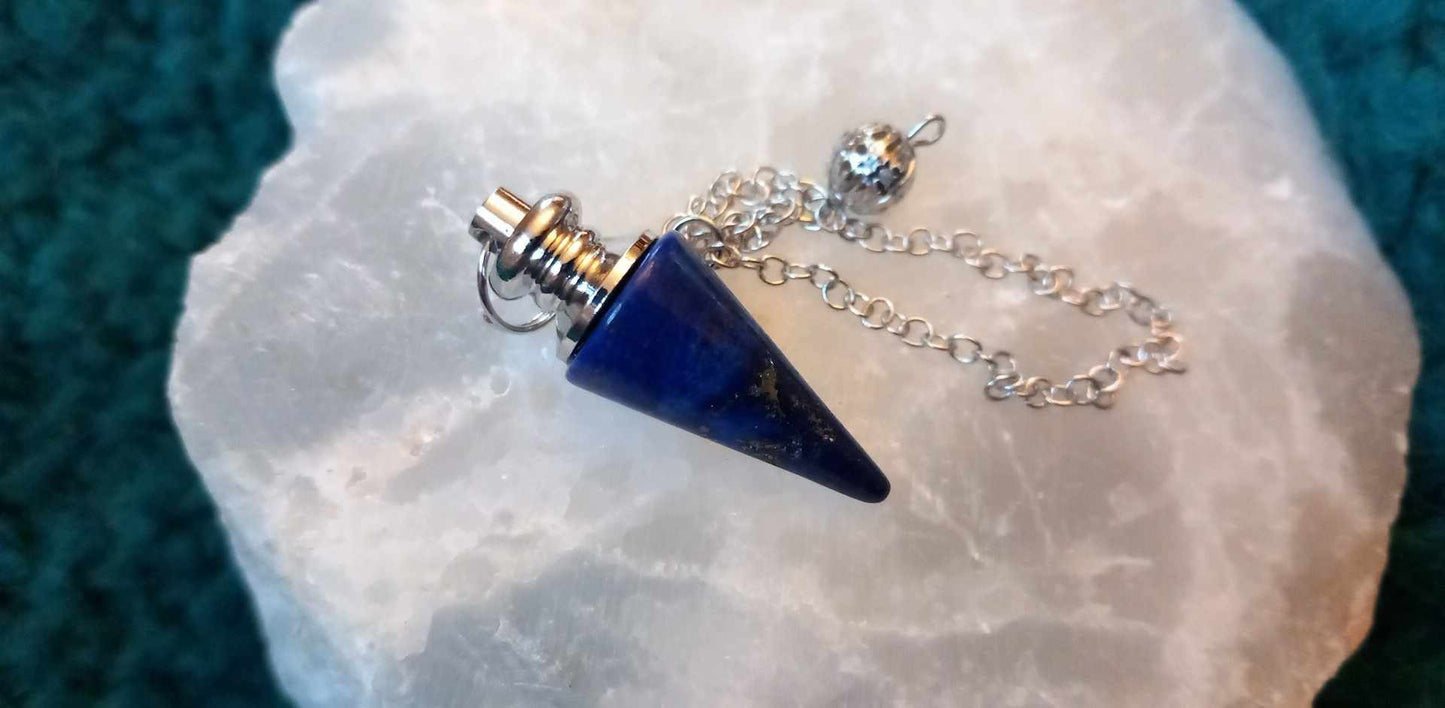 Spiss Pendulum. Ass krystaller