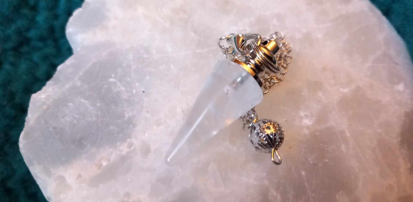Spiss Pendulum. Ass krystaller