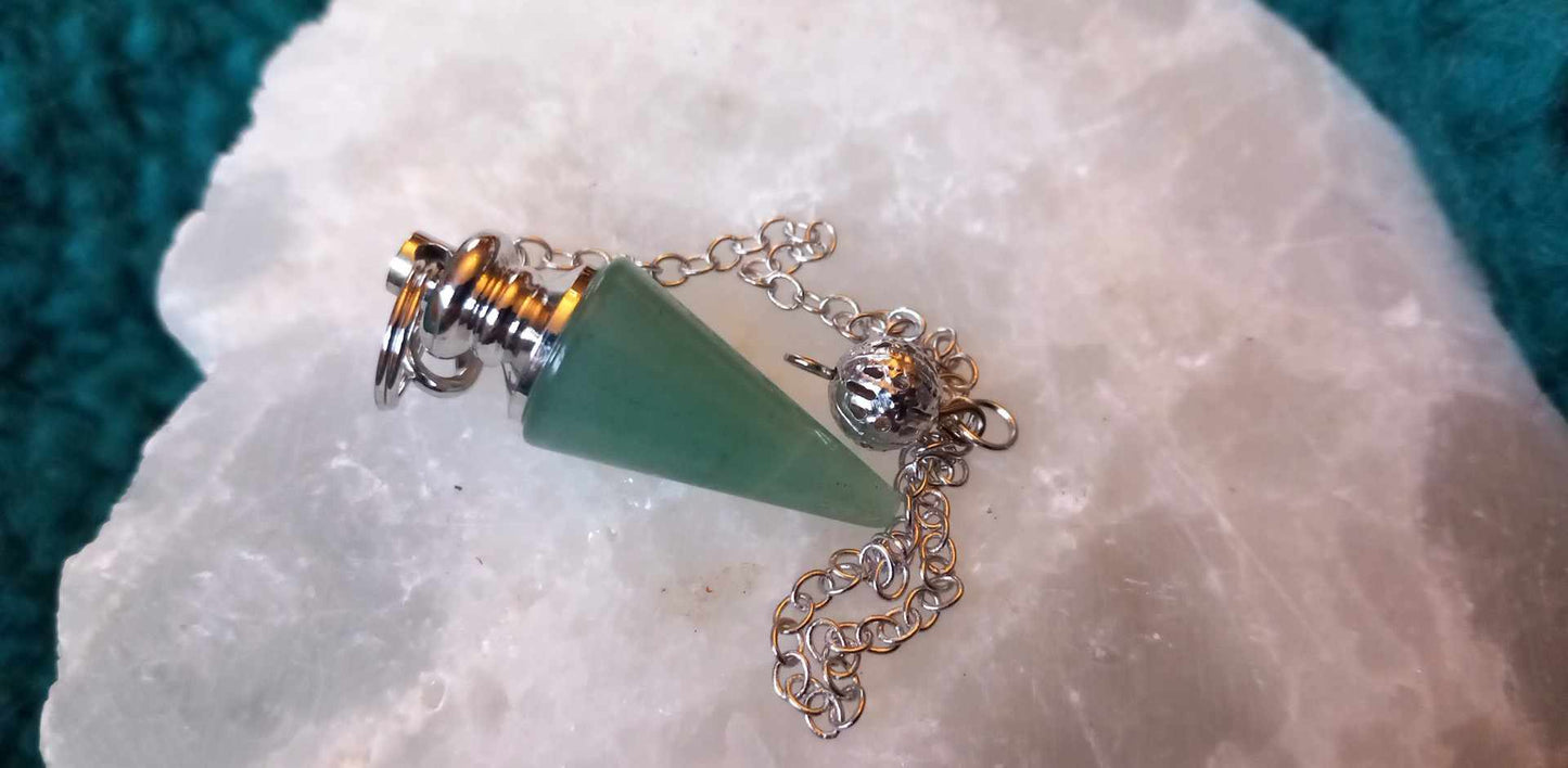 Spiss Pendulum. Ass krystaller