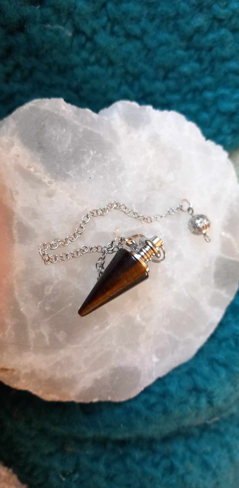 Spiss Pendulum. Ass krystaller