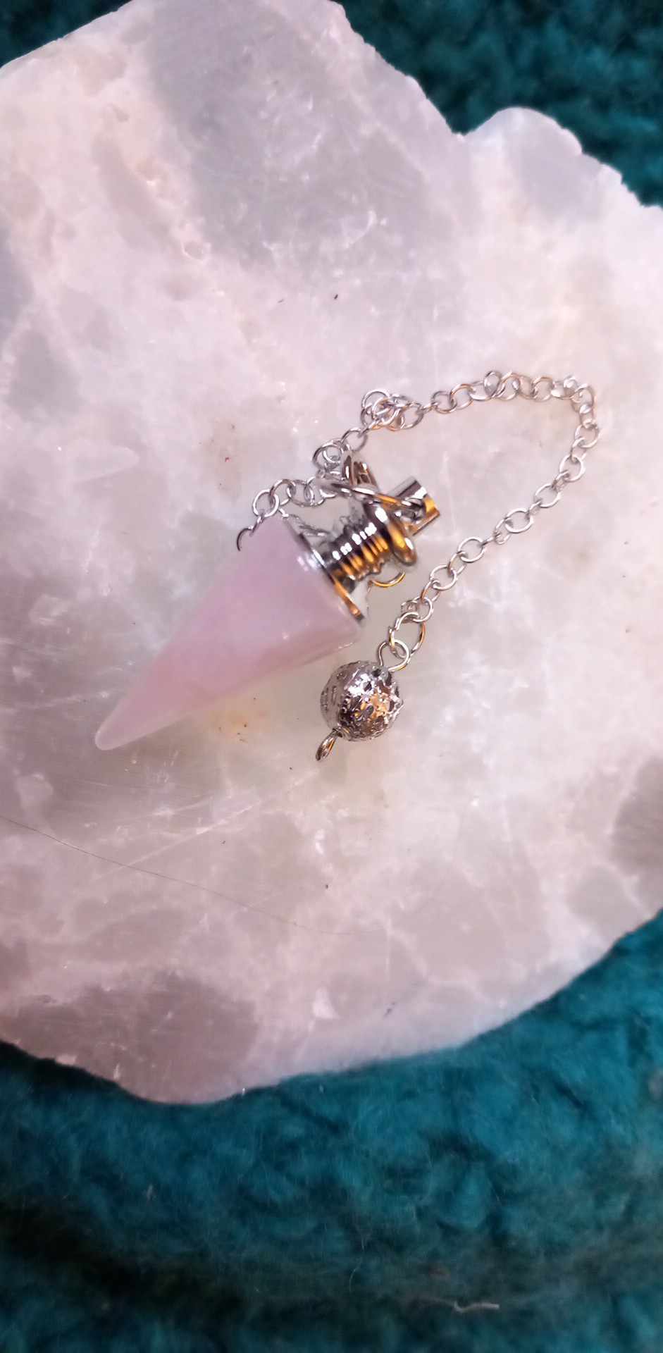 Spiss Pendulum. Ass krystaller