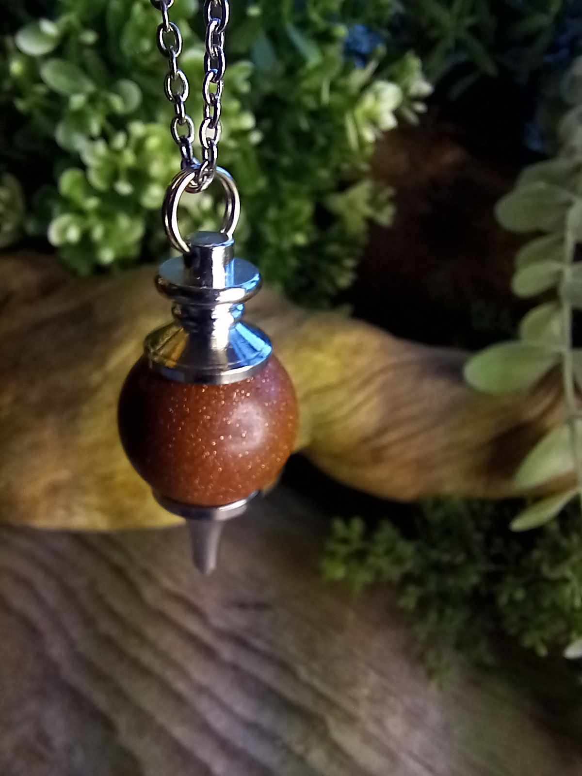 Brunrød Gullstein Pendulum